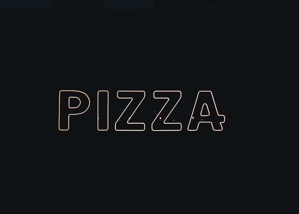 a black background with the word pizza written in gold