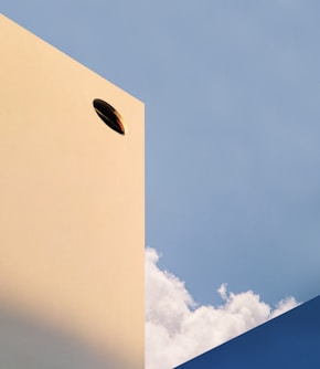 white concrete building under blue sky during daytime