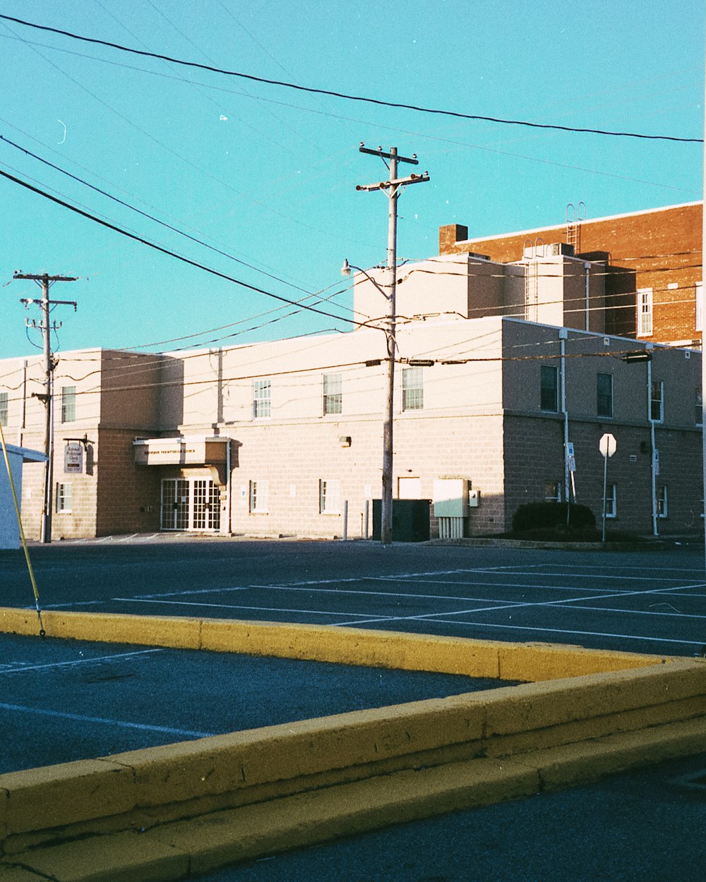 white concrete building near road during daytime