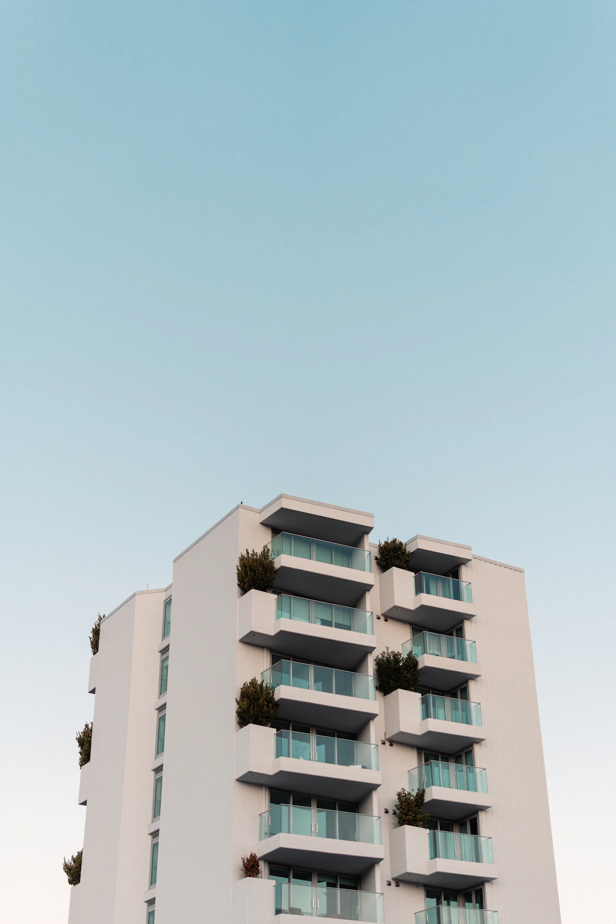 Apartment building exterior against a clear sky