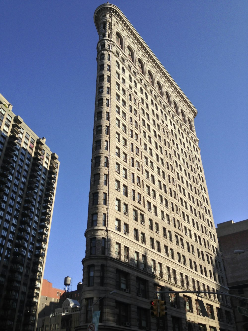 white and brown concrete building under blue sky during daytime