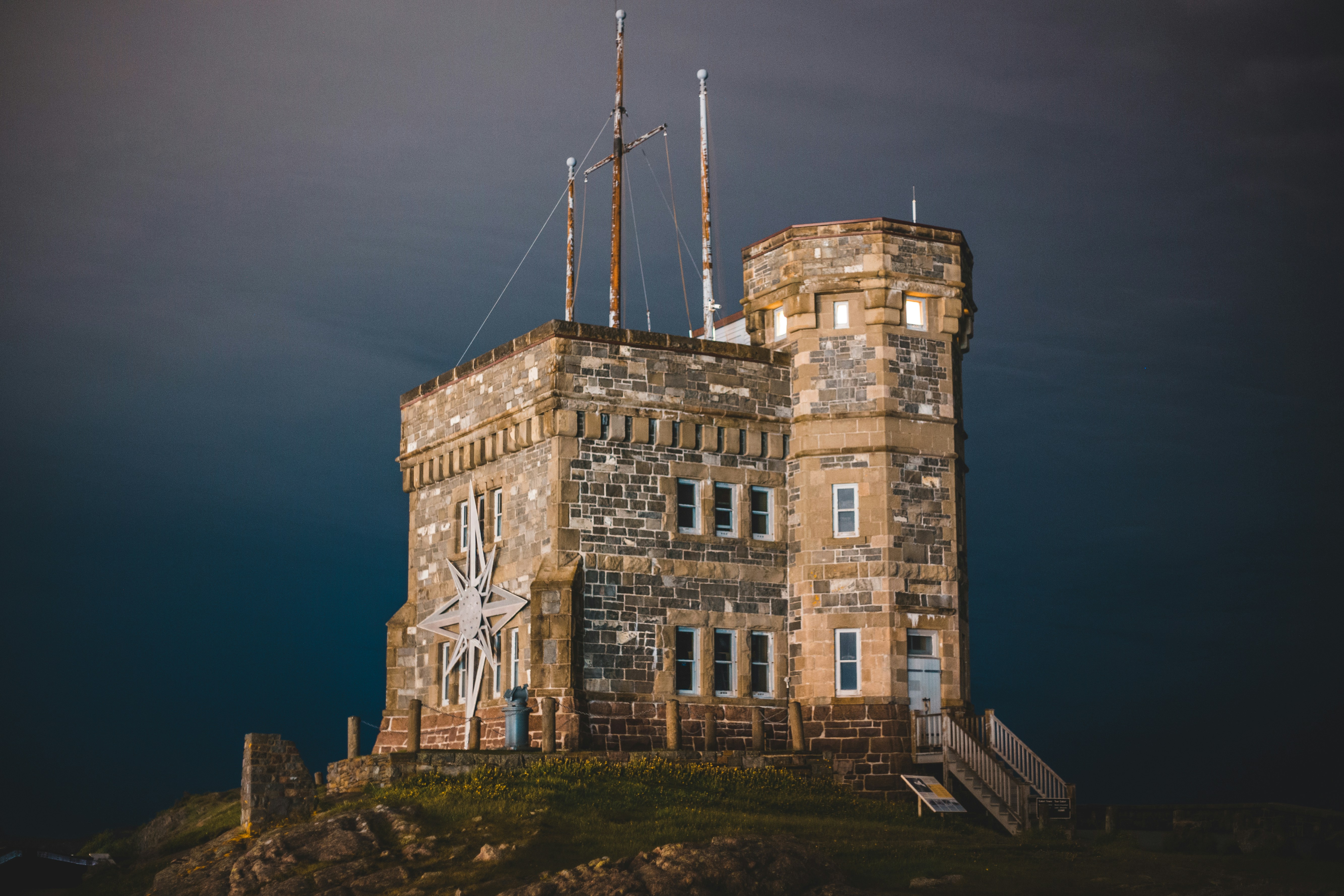 brown concrete building during night time