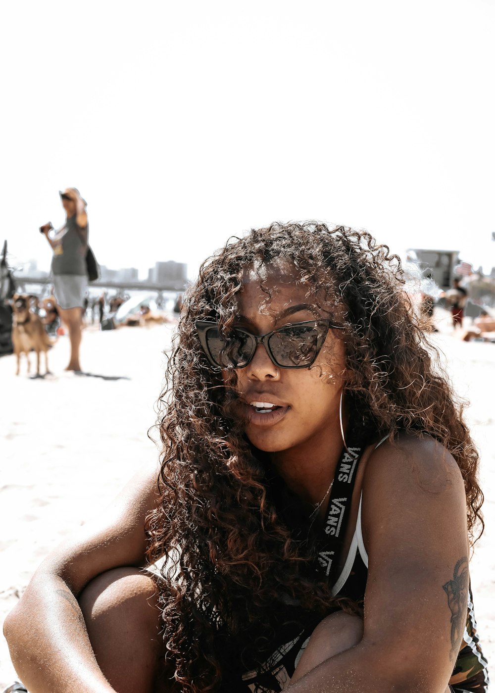 woman in black tank top wearing black sunglasses