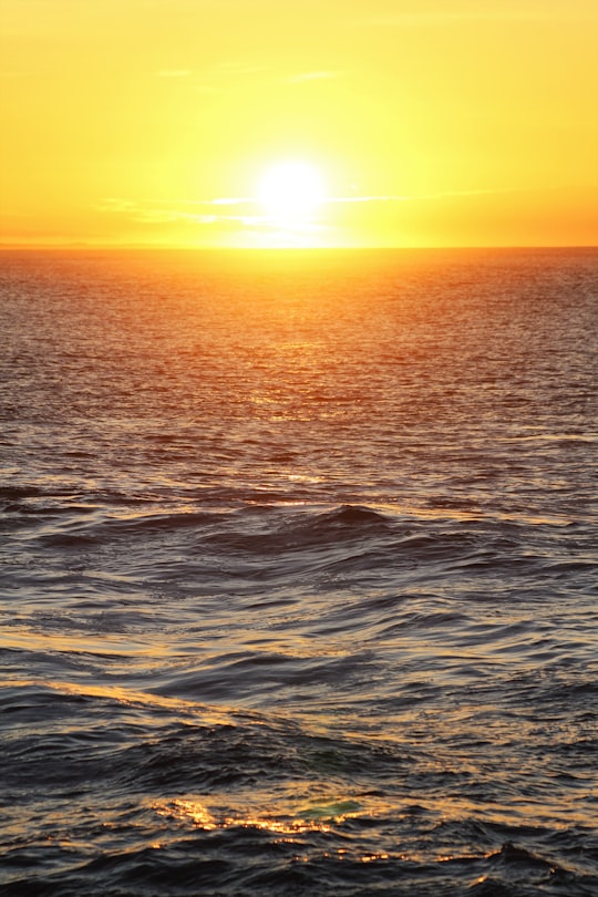 body of water during sunset in Port Alfred South Africa