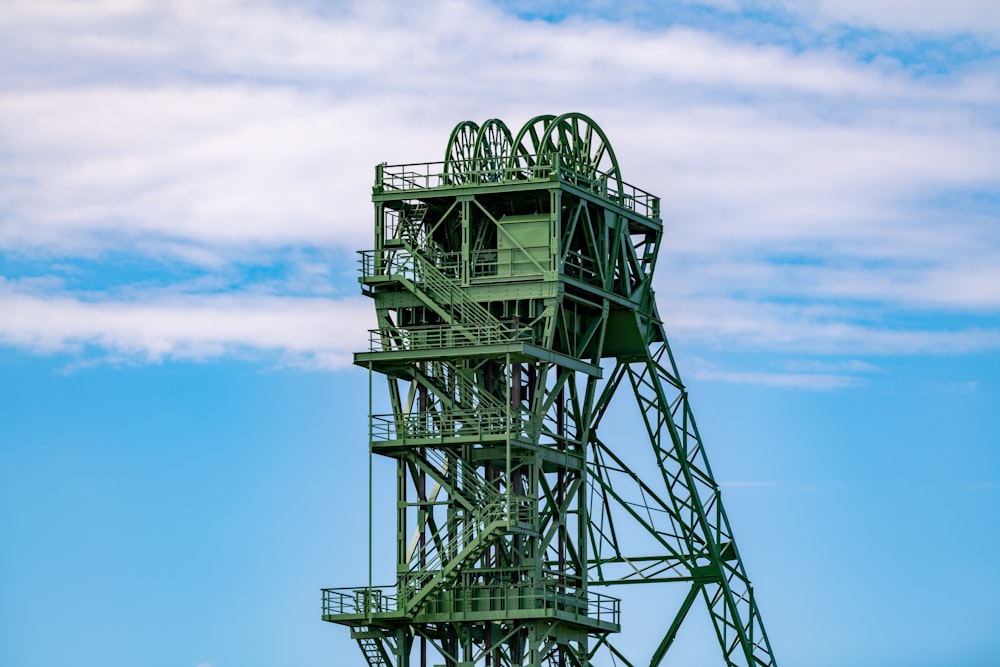 black metal tower under blue sky