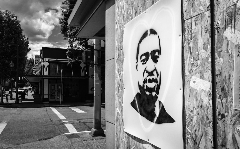 grayscale photo of womans face wall art