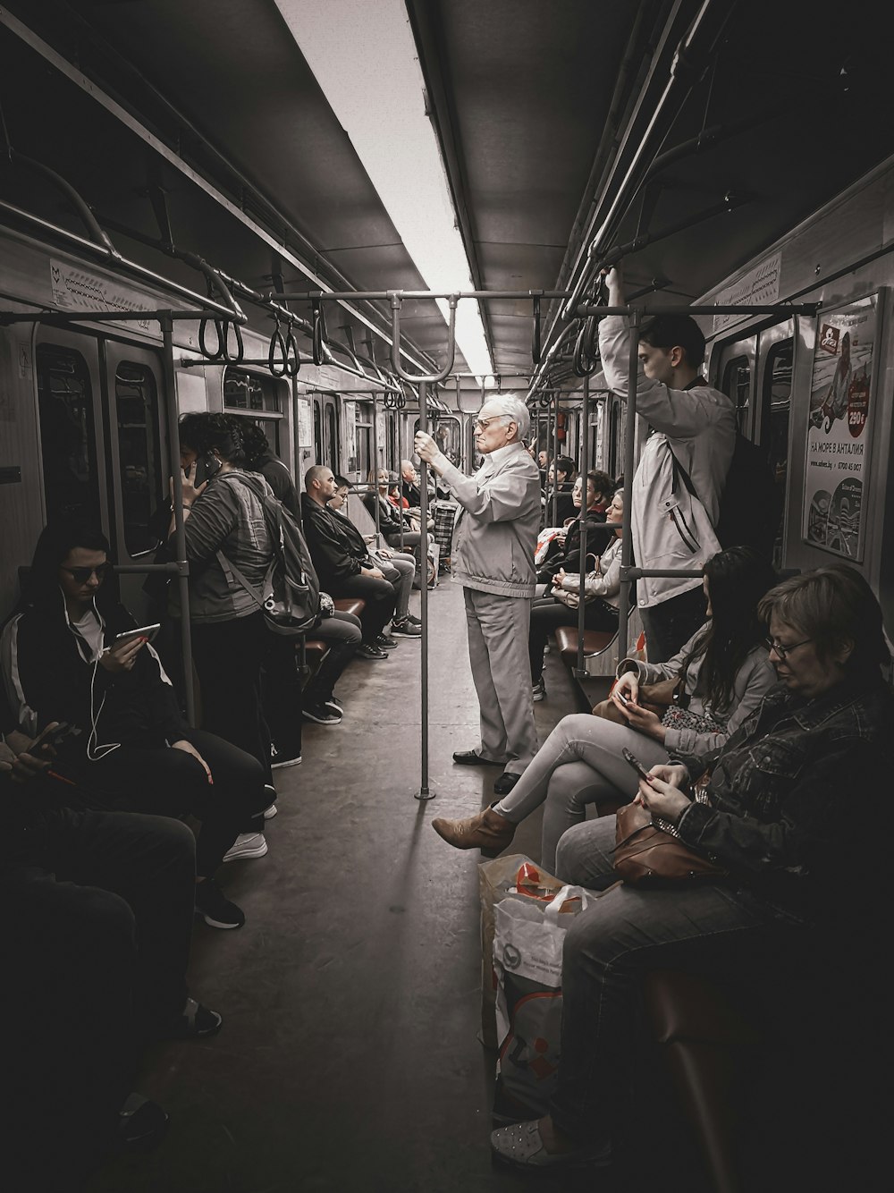 people sitting inside train during daytime