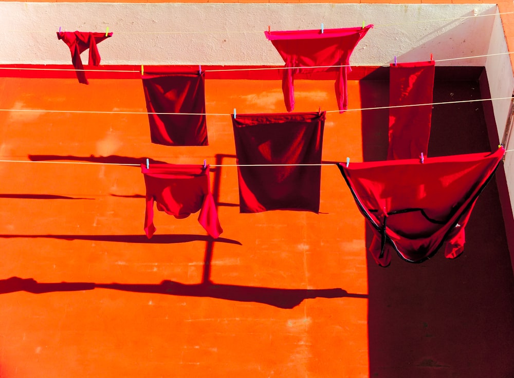 red and black folding chairs on brown sand