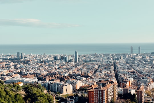 aerial view of city buildings during daytime in Park Güell Spain