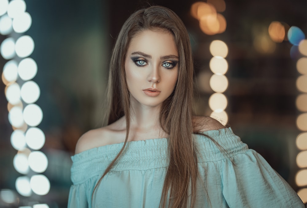 woman in gray coat with brown hair