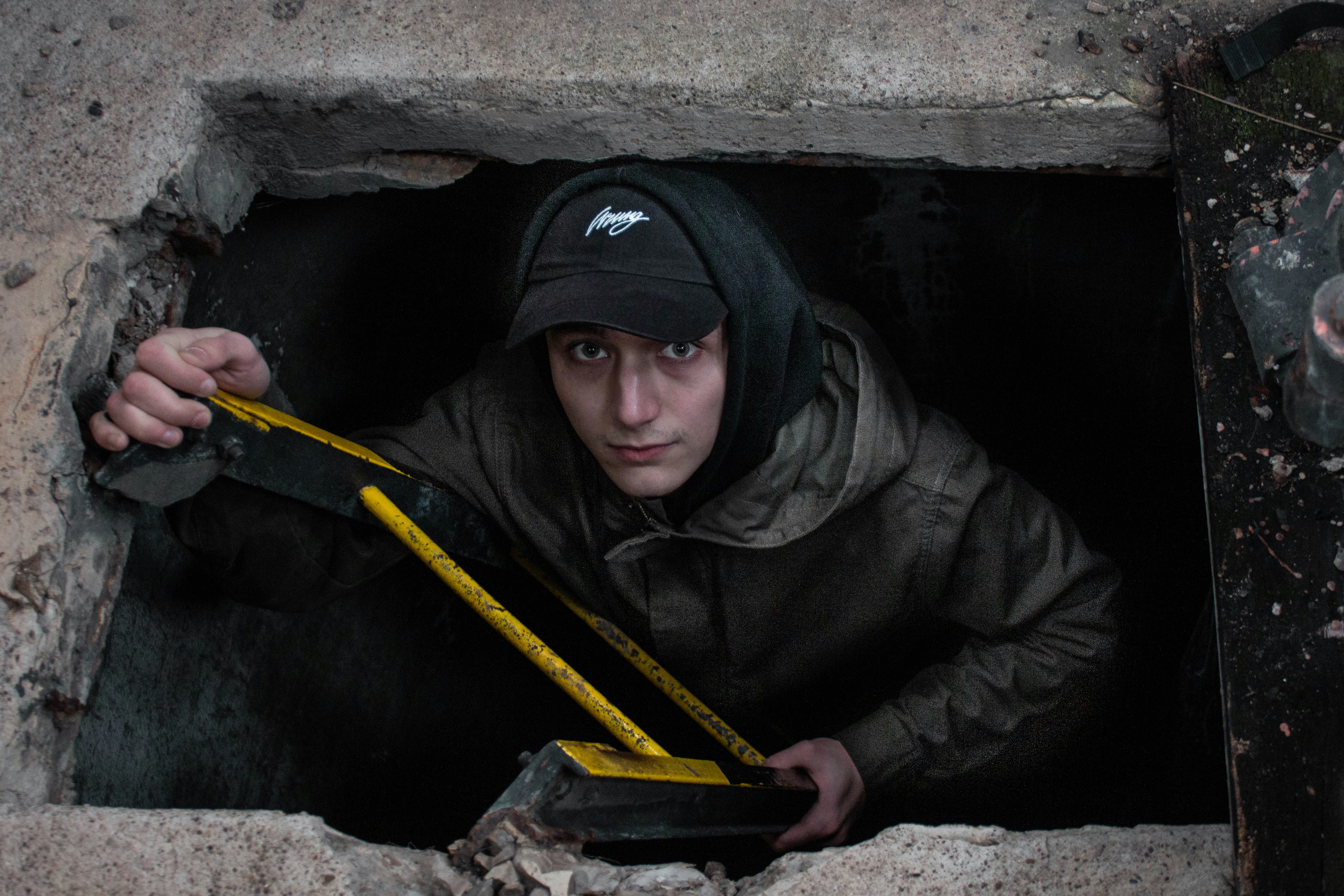 inspector examining underfloor area