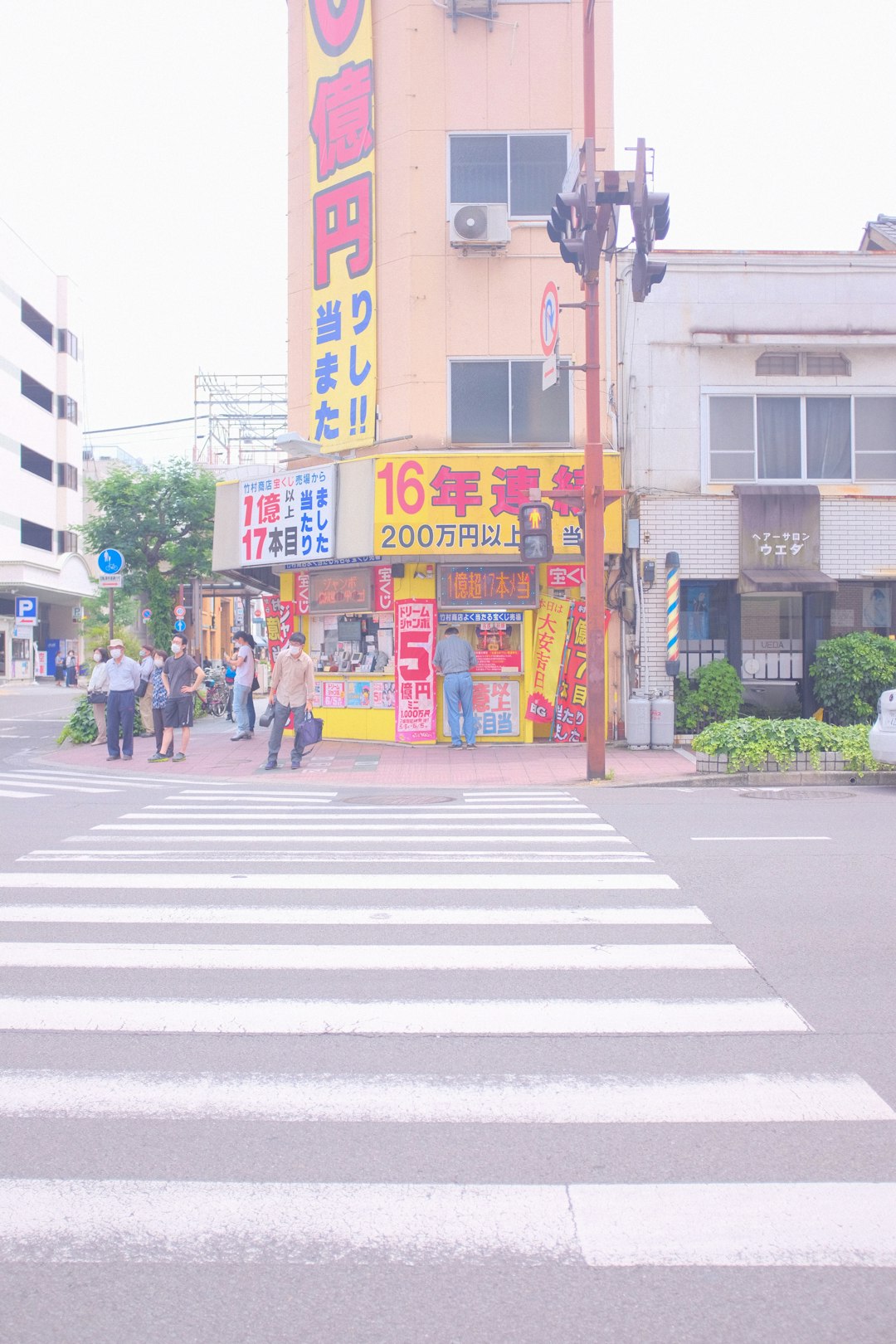 people walking on pedestrian lane during daytime