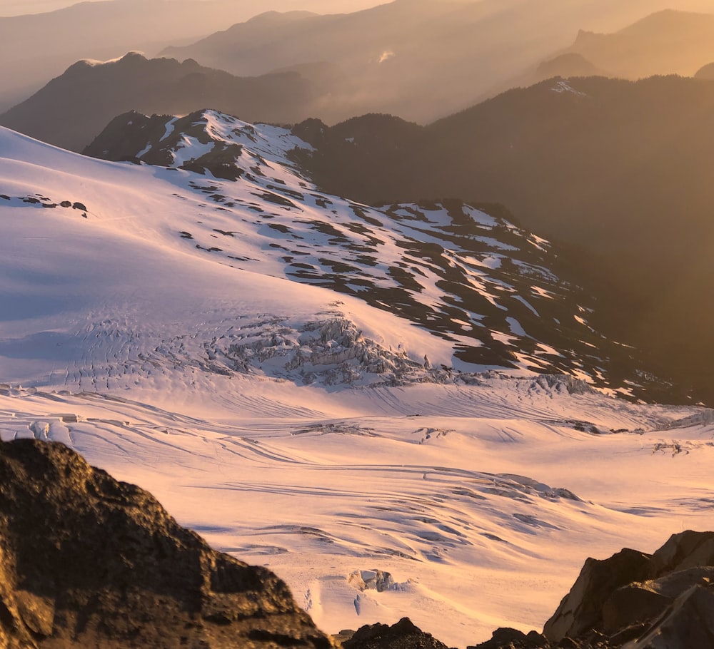 snow covered mountain during daytime