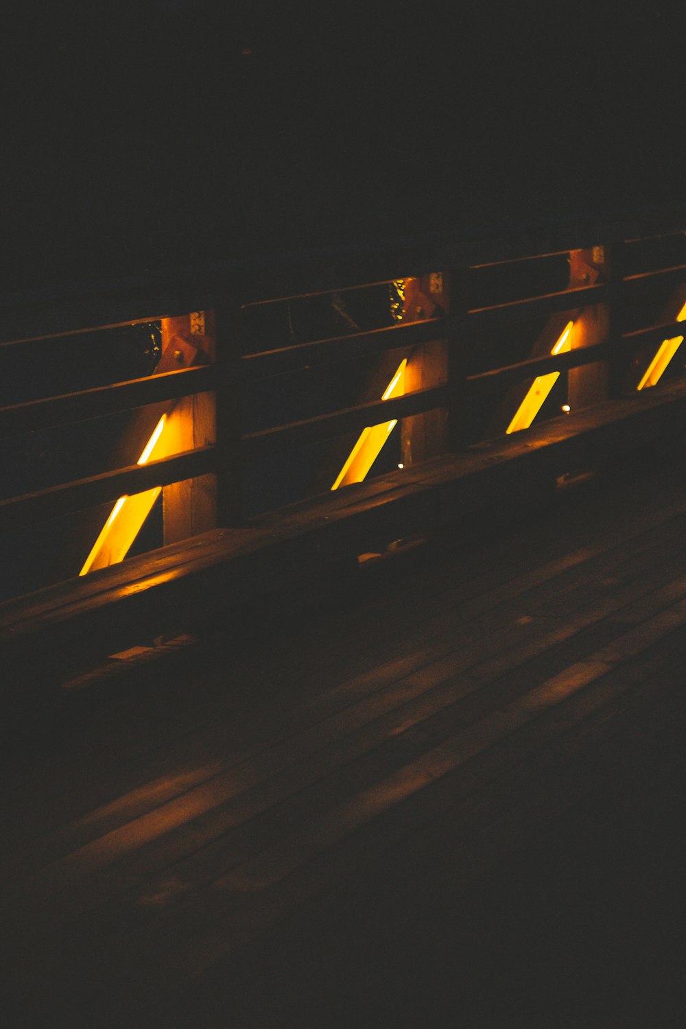 brown wooden stairs with light