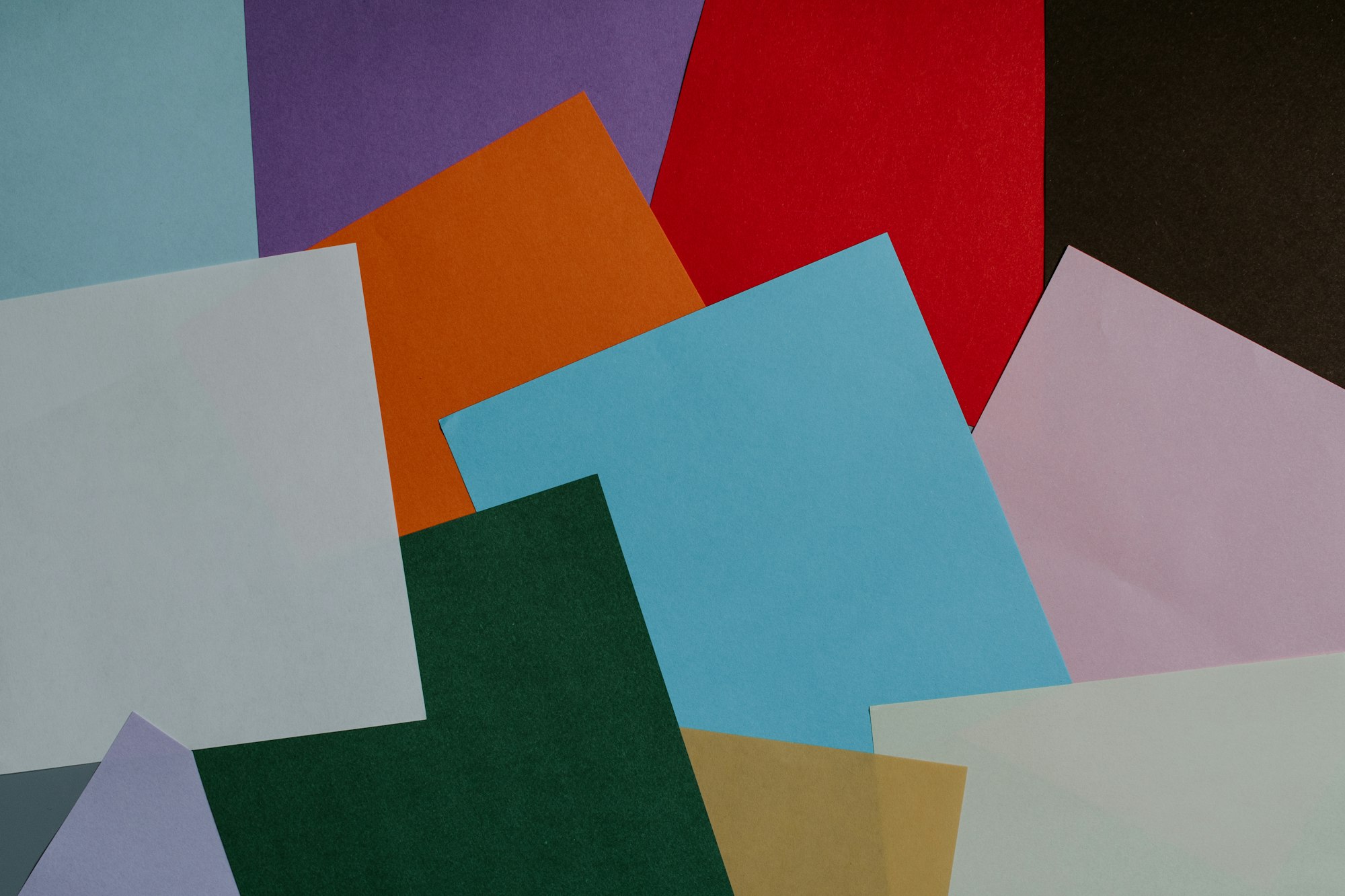 sheets of layered colored paper