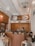 A cozy coffee shop interior filled with happy customers.