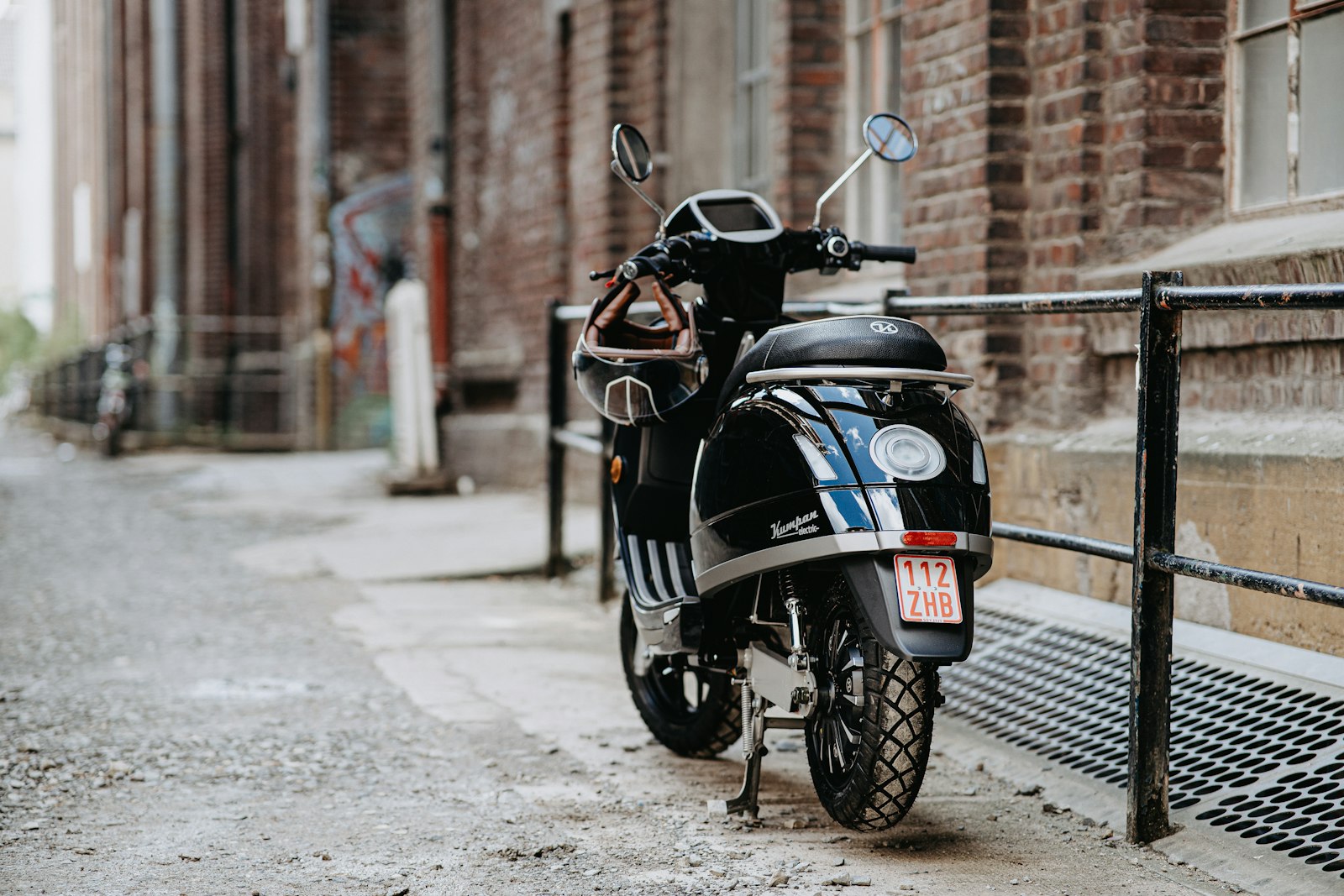 ZEISS Batis 85mm F1.8 sample photo. Black and red motorcycle photography