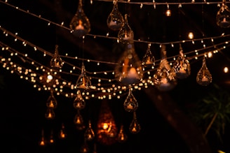 A warm gathering of holiday lighting enthusiasts sharing ideas under soft southwestern lighting.