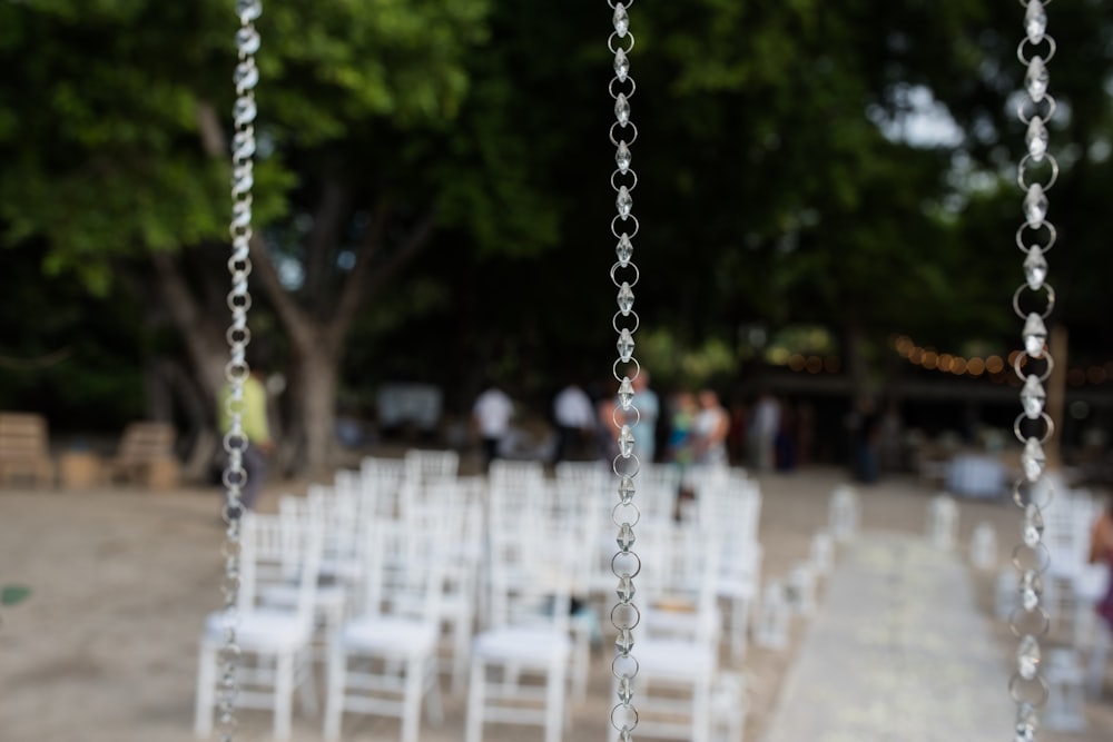 silver chain link fence with water droplets