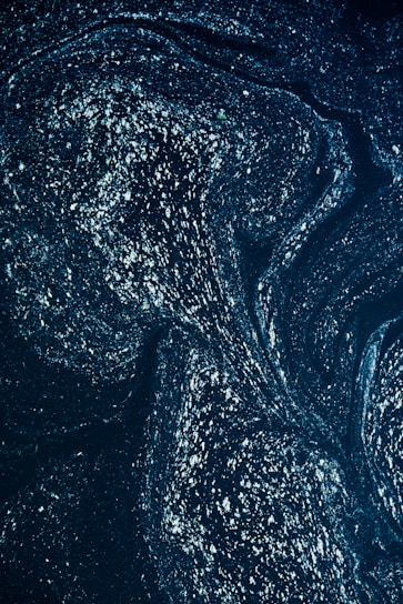 A cosmic landscape blending stars and abstract waves of energy, evoking a journey through collective consciousness.