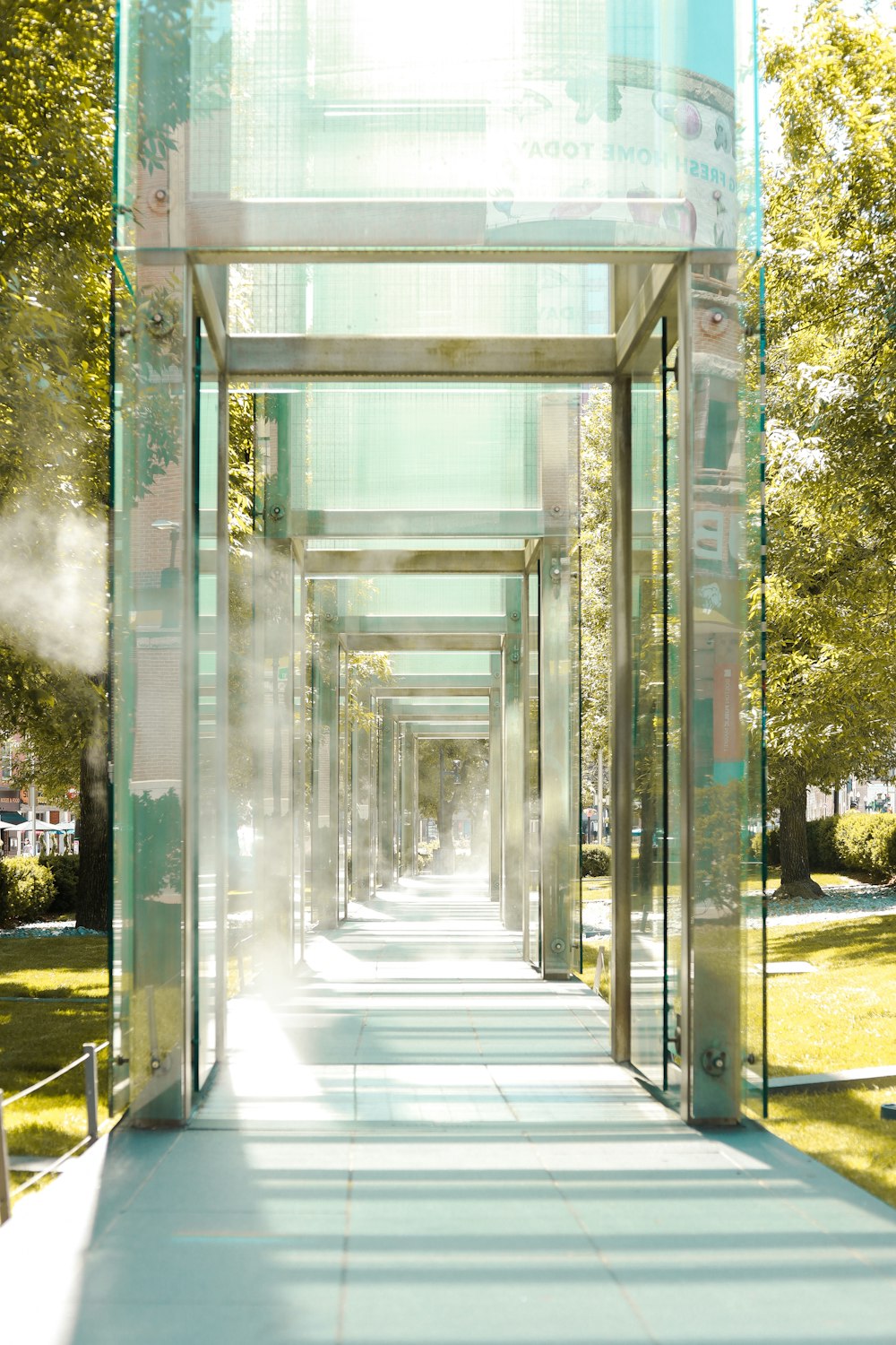 white concrete building near green trees during daytime