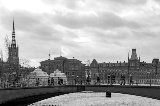 grayscale photo of concrete building in Gamla stan Sweden