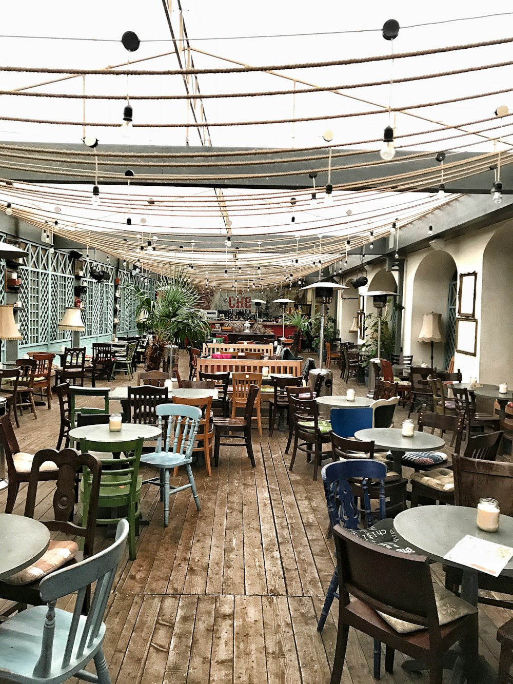 brown wooden chairs and tables inside building