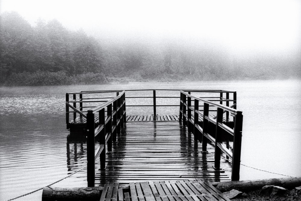 wooden dock on body of water