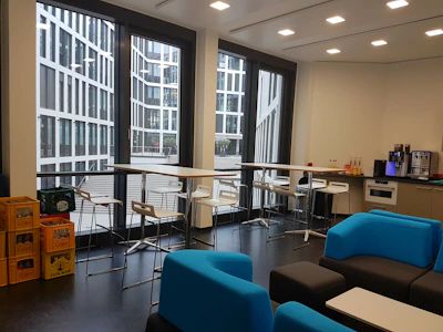 Freshly cleaned and gleaming kitchen area in a corporate break room