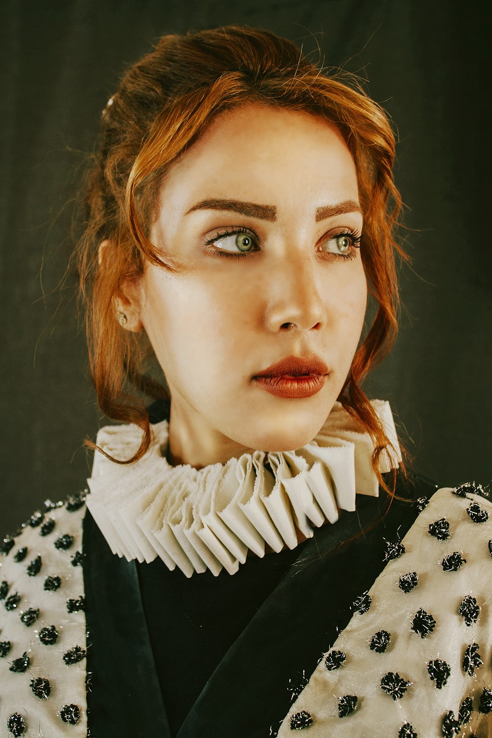 woman in black and white floral shirt