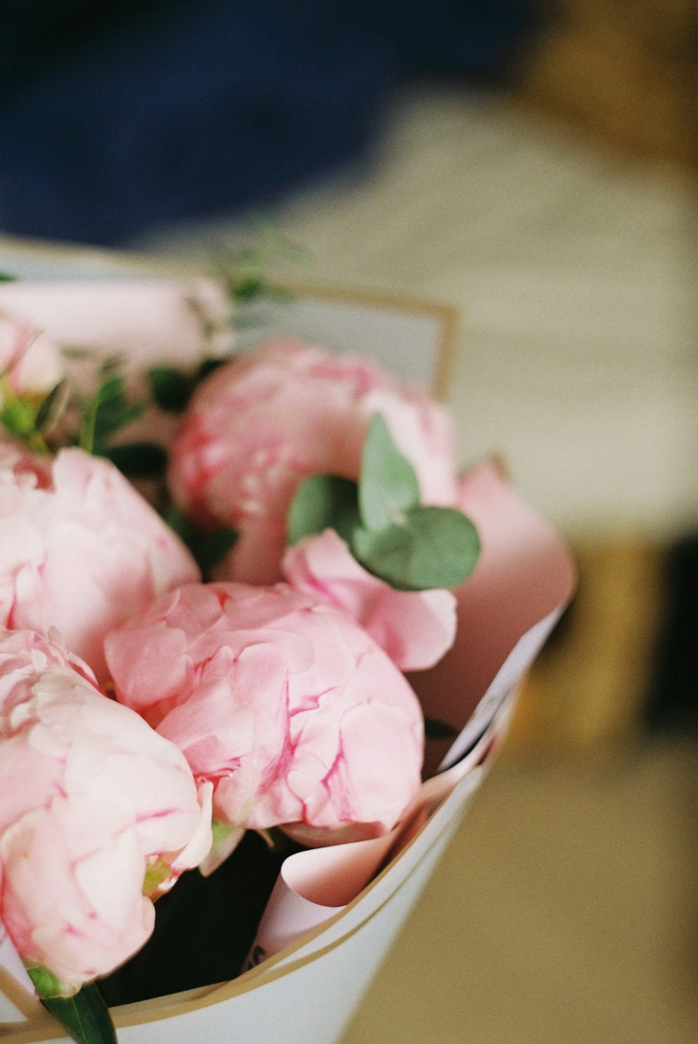 pink roses on white ceramic bowl