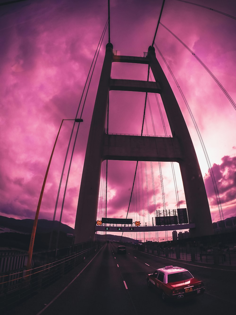 gray bridge under gray sky