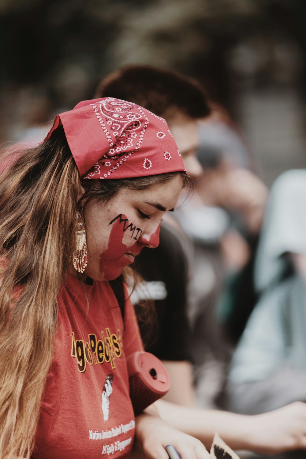 woman in red and white hoodie wearing red bandana photo – Free Denver Image  on Unsplash