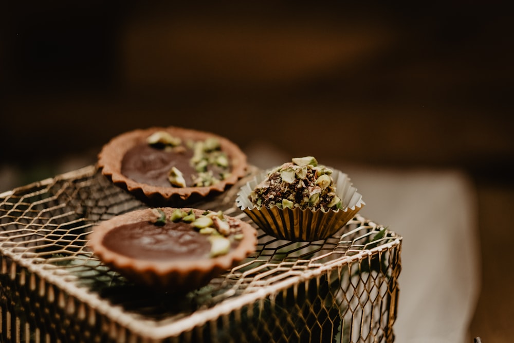 cupcakes on white steel rack