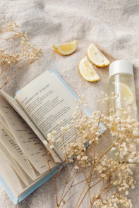 white book page with yellow flower petals