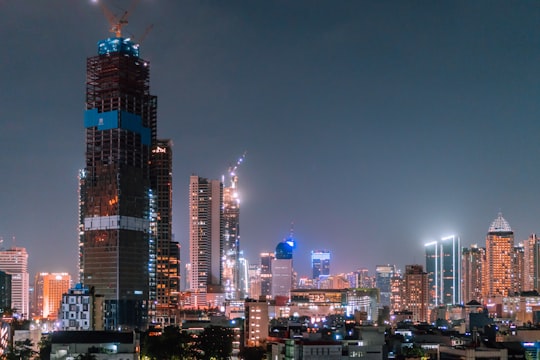 city with high rise buildings during night time in Jakarta Pusat Indonesia