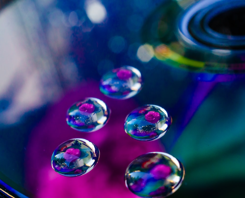 purple and blue bubble in close up photography