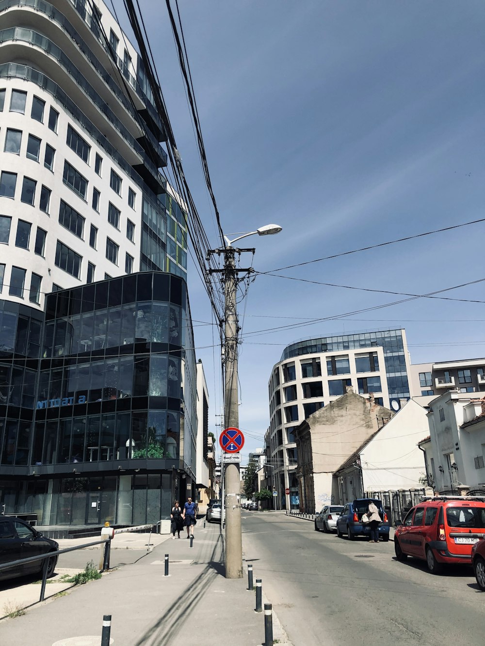 cars on road near buildings during daytime