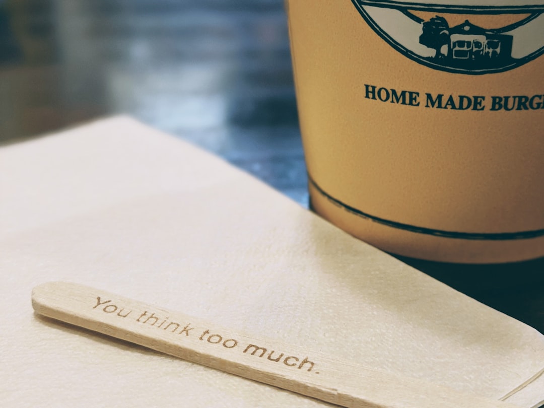yellow and black paper cup,