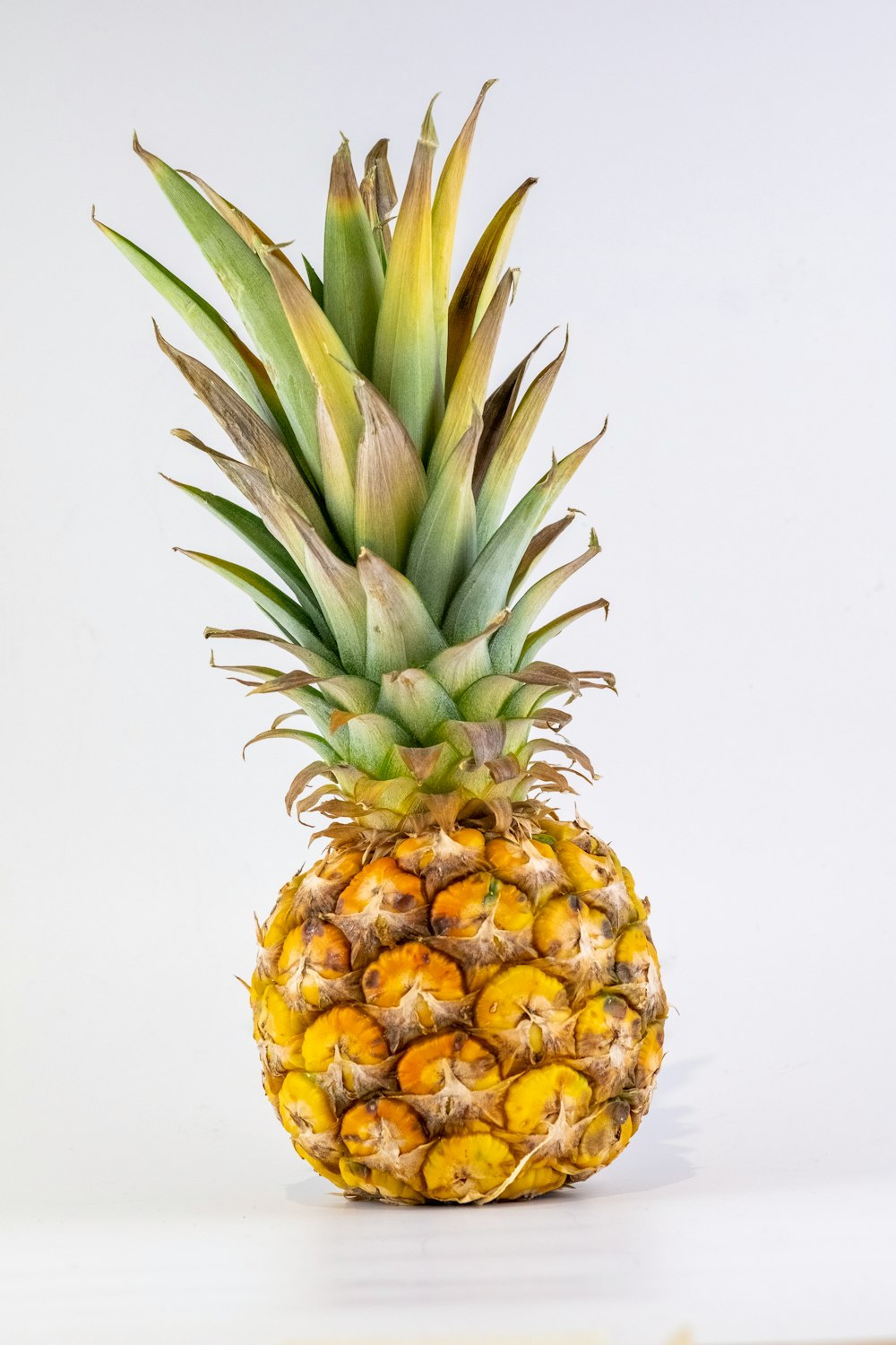 pineapple fruit on white table