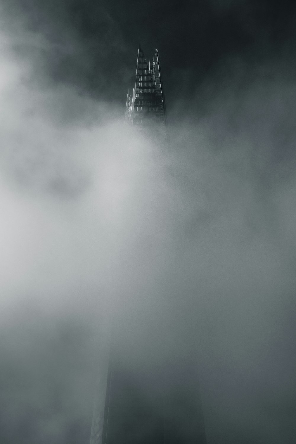 gray clouds over city skyline during daytime