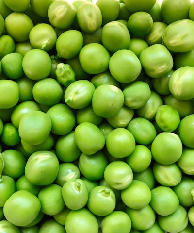 green round fruits in close up photography