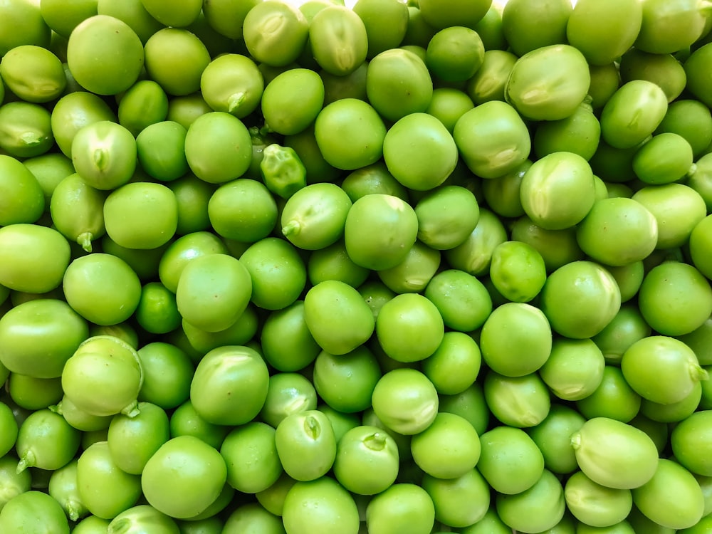 green round fruits in close up photography