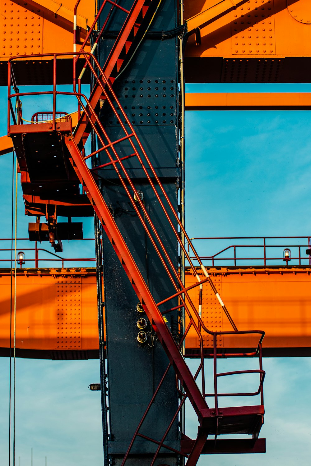 orange and black metal crane