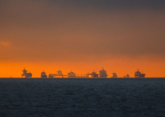 silhouette of city skyline during sunset