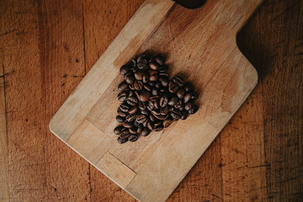 coffee beans on brown wooden table