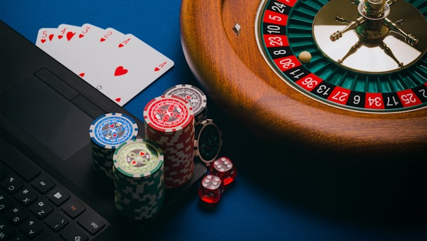 Playing cards and dice on a wooden table
