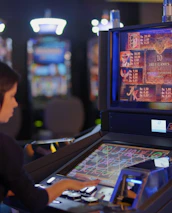Happy player celebrating a big win on an online casino slot game.