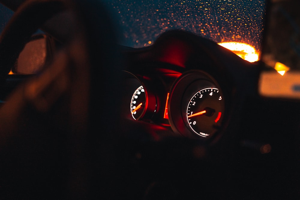 red and black analog watch