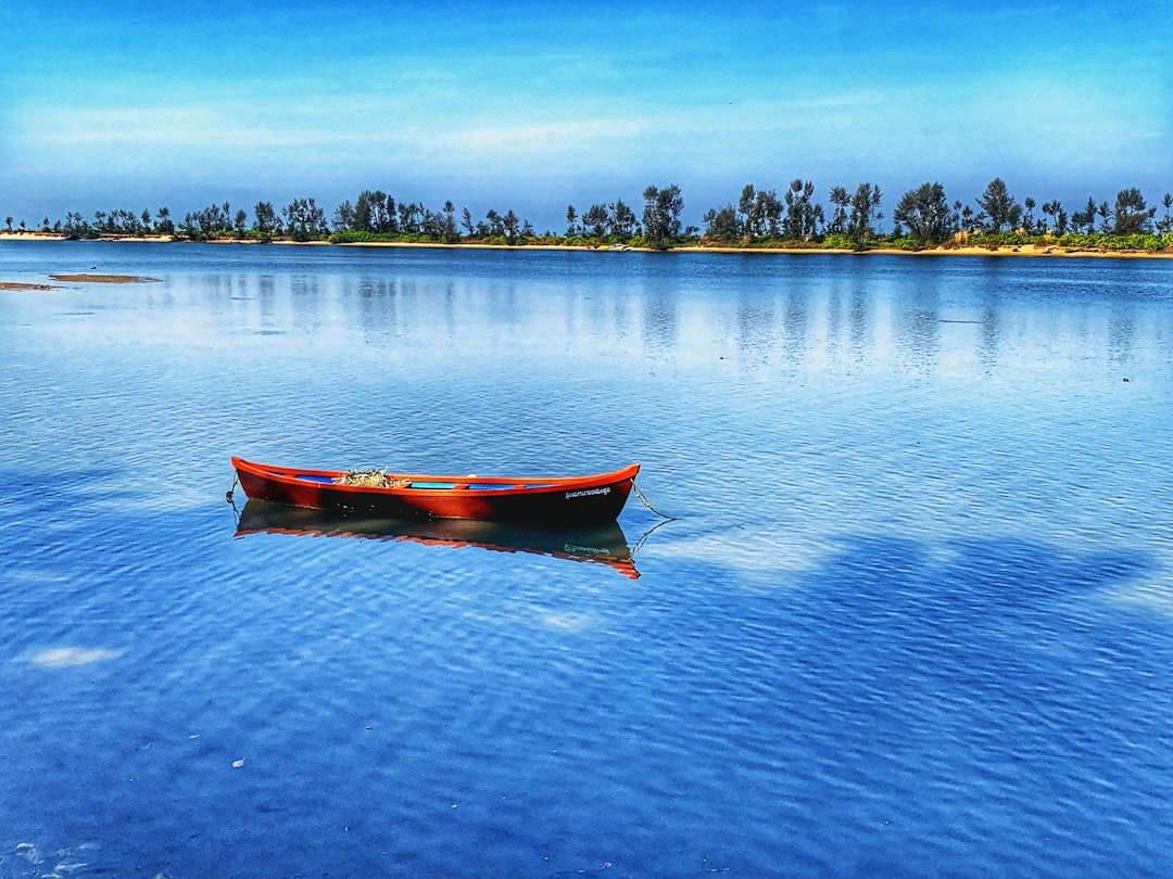 photo of Mulki Watercraft rowing near St. Mary's Islands